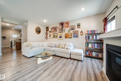 3632 Keswick Boulevard Sw, Edmonton, AB - Indoor Photo Showing Living Room With Fireplace