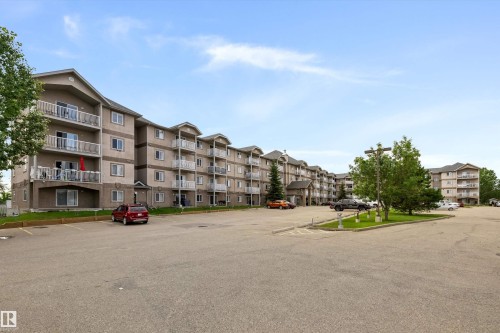 #221 240 Spruce Ridge Rd, Spruce Grove, AB - Outdoor With Balcony With Facade