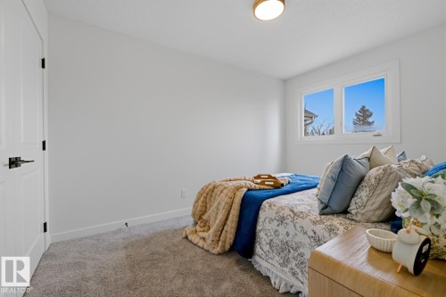 7D Callingwood Court Nw, Edmonton, AB - Indoor Photo Showing Bedroom