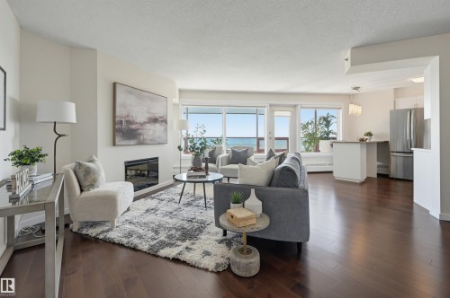 #1003 12319 Jasper Av Nw, Edmonton, AB - Indoor Photo Showing Living Room With Fireplace