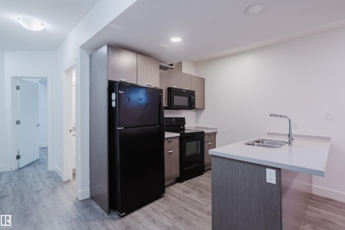 8722 150 Street Nw, Edmonton, AB - Indoor Photo Showing Kitchen With Double Sink