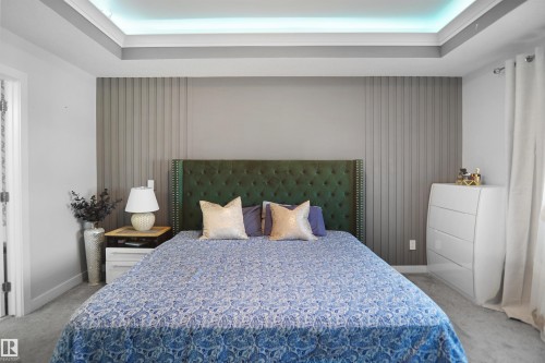 Tray ceiling with recessed lighting - 4003 39 Street, Beaumont, AB - Indoor Photo Showing Bedroom