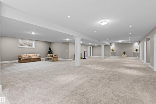 Finished basement with light carpet and recessed lighting - 2796 Wheaton Drive Nw, Edmonton, AB - Indoor Photo Showing Basement