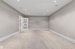 Home Theatre ready room with light carpet and recessed lighting - 