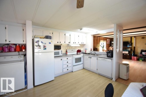 5222 3Rd Avenue, Boyle, AB - Indoor Photo Showing Kitchen With Double Sink