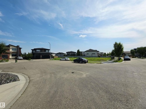 Cleared residential lot featuring a flat topography and visible curbing - 4178 Cameron Heights Point(E) Nw, Edmonton, AB 