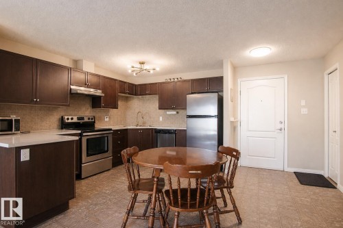 #7206 7327 South Terwillegar Dr Nw, Edmonton, AB - Indoor Photo Showing Kitchen With Stainless Steel Kitchen