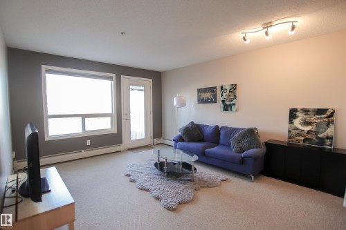 #7206 7327 South Terwillegar Dr Nw, Edmonton, AB - Indoor Photo Showing Living Room