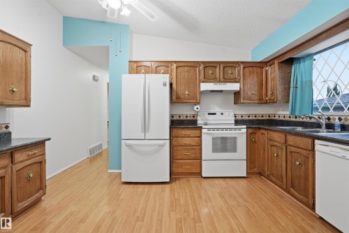 6903 151 Avenue Nw, Edmonton, AB - Indoor Photo Showing Kitchen With Double Sink