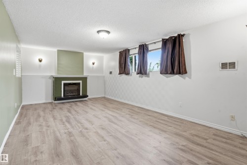 6903 151 Avenue Nw, Edmonton, AB - Indoor With Fireplace