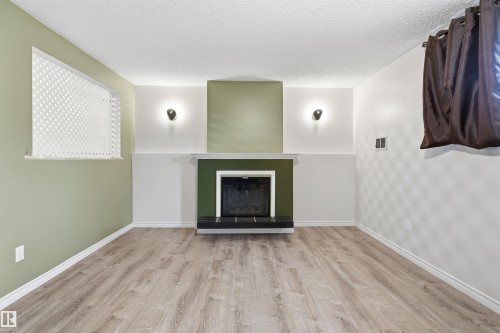 6903 151 Avenue Nw, Edmonton, AB - Indoor With Fireplace