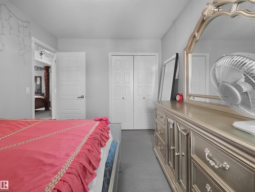 Room with gray carpet flooring, white walls, and a recessed ceiling - 1716 60 Street Sw, Edmonton, AB - Indoor Photo Showing Bedroom