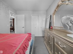 Room with gray carpet flooring, white walls, and a recessed ceiling - 