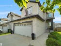Two-story residence featuring light-toned siding and dark trim accents - 1716 60 Street Sw, Edmonton, AB  - Outdoor 