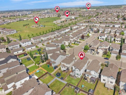 Aerial view of a residential neighborhood featuring detached homes with varying rooflines - 1716 60 Street Sw, Edmonton, AB - Outdoor With View