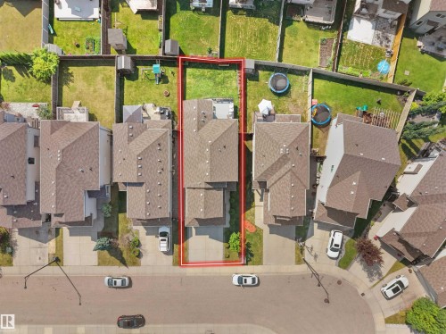 Aerial view showcasing a residential property with a multi-story structure and a sloped roof - 1716 60 Street Sw, Edmonton, AB -  With View