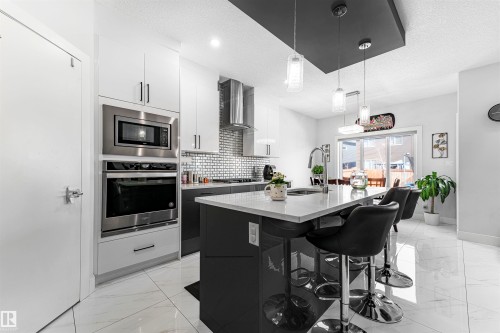 16212 32 Avenue Sw, Edmonton, AB - Indoor Photo Showing Kitchen With Upgraded Kitchen