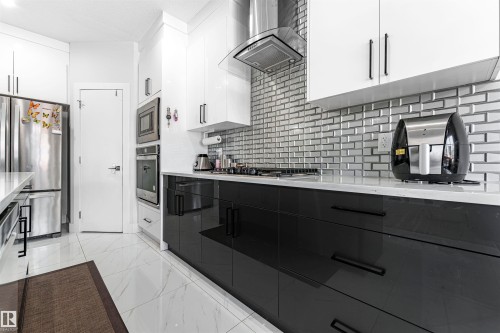 16212 32 Avenue Sw, Edmonton, AB - Indoor Photo Showing Kitchen With Upgraded Kitchen