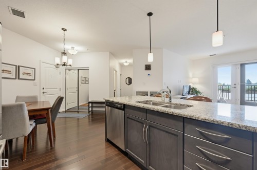 #110 6083 Maynard Wy Nw, Edmonton, AB - Indoor Photo Showing Other Room