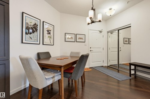 #110 6083 Maynard Wy Nw, Edmonton, AB - Indoor Photo Showing Dining Room