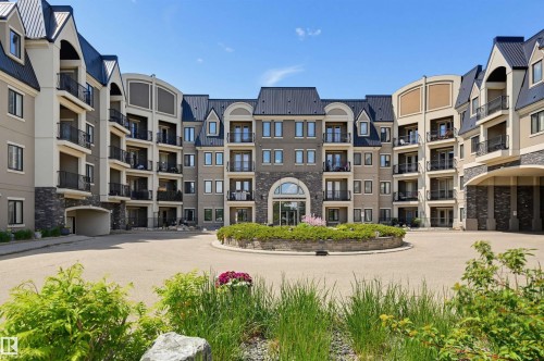 #110 6083 Maynard Wy Nw, Edmonton, AB - Outdoor With Facade