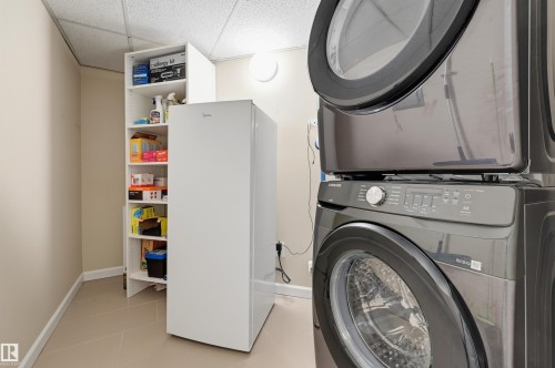 #110 6083 Maynard Wy Nw, Edmonton, AB - Indoor Photo Showing Laundry Room