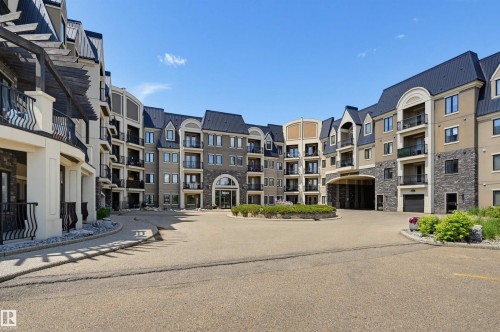 #110 6083 Maynard Wy Nw, Edmonton, AB - Outdoor With Facade