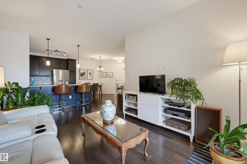 #110 6083 Maynard Wy Nw, Edmonton, AB - Indoor Photo Showing Living Room