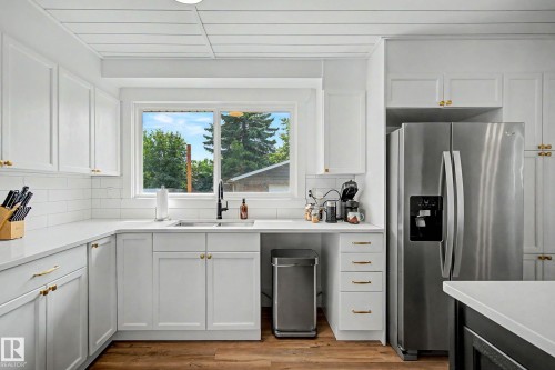 4305 43A Avenue, Leduc, AB - Indoor Photo Showing Kitchen With Double Sink