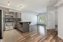 #103 10611 117 St Nw, Edmonton, AB  - Indoor Photo Showing Kitchen With Stainless Steel Kitchen 
