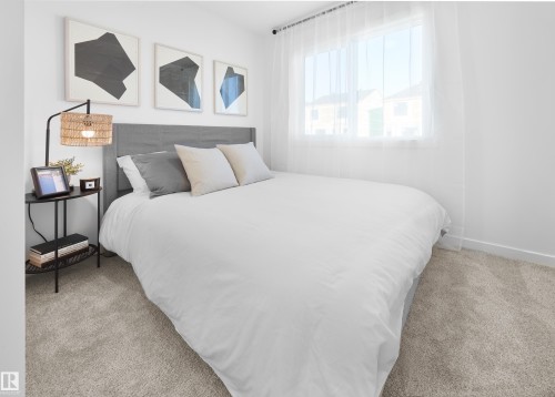 3 18628 18 Avenue Nw, Edmonton, AB - Indoor Photo Showing Bedroom