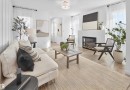 3 18628 18 Avenue Nw, Edmonton, AB  - Indoor Photo Showing Living Room With Fireplace 