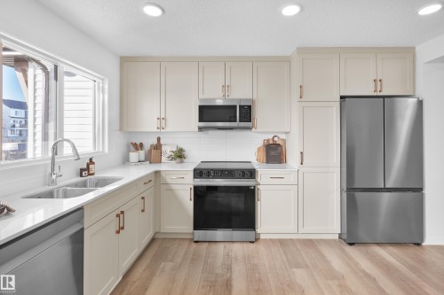 3 18628 18 Avenue Nw, Edmonton, AB - Indoor Photo Showing Kitchen With Double Sink With Upgraded Kitchen