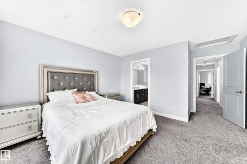 Bedroom featuring light gray wall paint and gray carpeting - 17508 58 Street Nw, Edmonton, AB - Indoor Photo Showing Bedroom