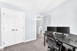 Neutral-toned carpeting paired with light blue walls - 