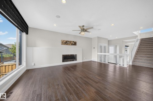 1116 Hainstock Green Sw, Edmonton, AB - Indoor Photo Showing Living Room With Fireplace