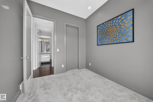 1116 Hainstock Green Sw, Edmonton, AB - Indoor Photo Showing Other Room
