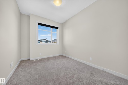 1116 Hainstock Green Sw, Edmonton, AB - Indoor Photo Showing Other Room