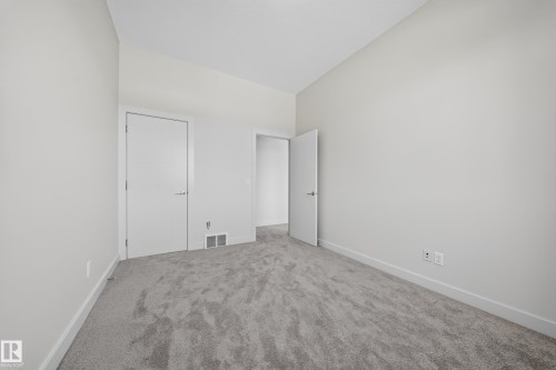1116 Hainstock Green Sw, Edmonton, AB - Indoor Photo Showing Other Room