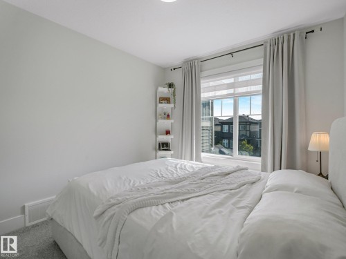 1214 Eaton Lane Nw, Edmonton, AB - Indoor Photo Showing Bedroom