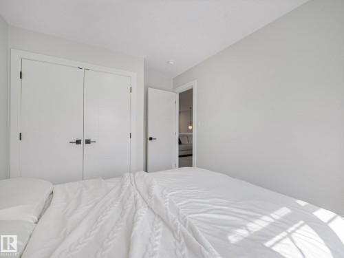 1214 Eaton Lane Nw, Edmonton, AB - Indoor Photo Showing Bedroom