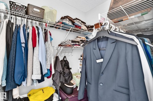 White wire shelving system providing multiple storage solutions - 5280 21 Avenue Sw, Edmonton, AB - Indoor With Storage