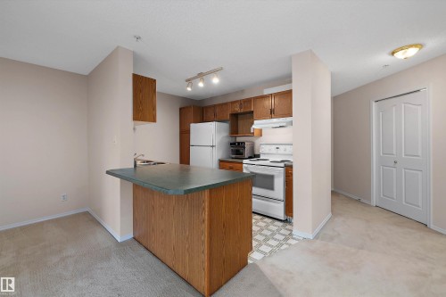 #207 911 Rabbit Hill Rd Nw, Edmonton, AB - Indoor Photo Showing Kitchen