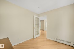 2nd Bedroom (or Office)  featuring laminate flooring, light-toned walls, and a white ceiling - 