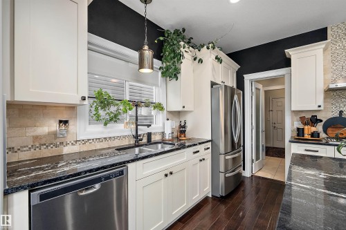 180 Sheppard Circle, Leduc, AB - Indoor Photo Showing Kitchen With Double Sink With Upgraded Kitchen