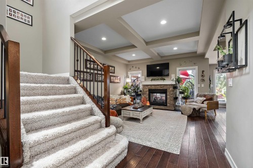 180 Sheppard Circle, Leduc, AB - Indoor Photo Showing Other Room With Fireplace