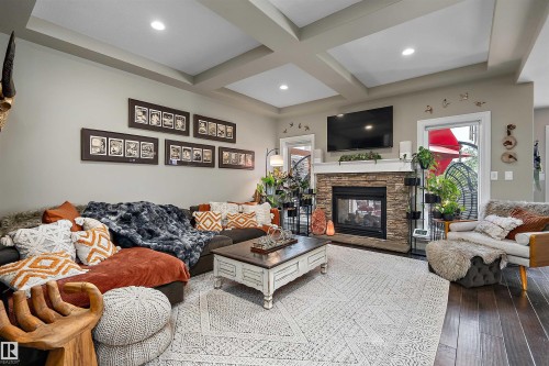 180 Sheppard Circle, Leduc, AB - Indoor Photo Showing Living Room With Fireplace