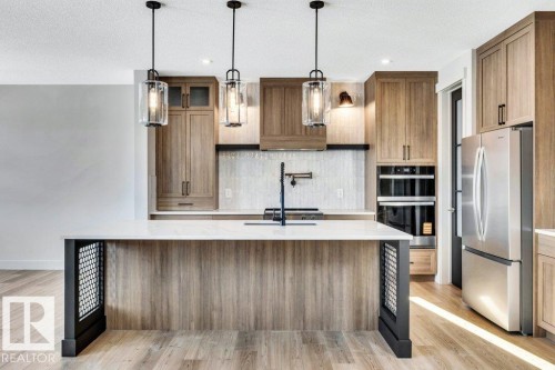 65 Norwyck Way, Spruce Grove, AB - Indoor Photo Showing Kitchen With Stainless Steel Kitchen With Upgraded Kitchen