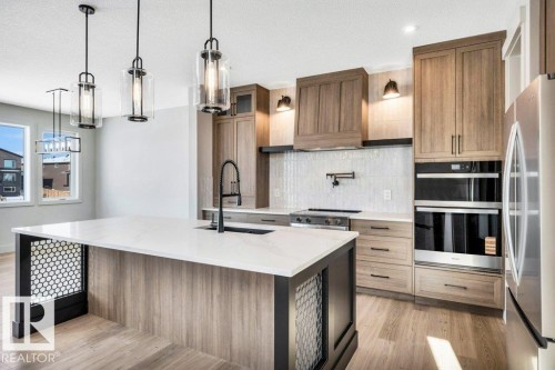 65 Norwyck Way, Spruce Grove, AB - Indoor Photo Showing Kitchen With Upgraded Kitchen