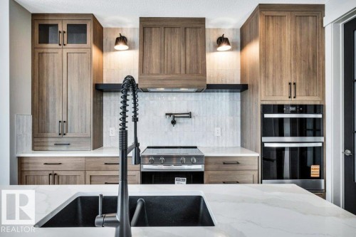 65 Norwyck Way, Spruce Grove, AB - Indoor Photo Showing Kitchen With Double Sink